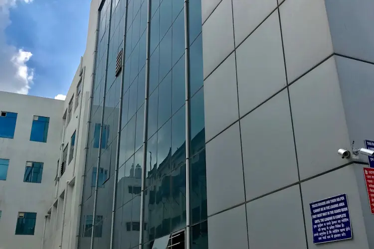 STAR Tools manufacturing facility showing production floor with workers assembling grease guns and lubrication equipment